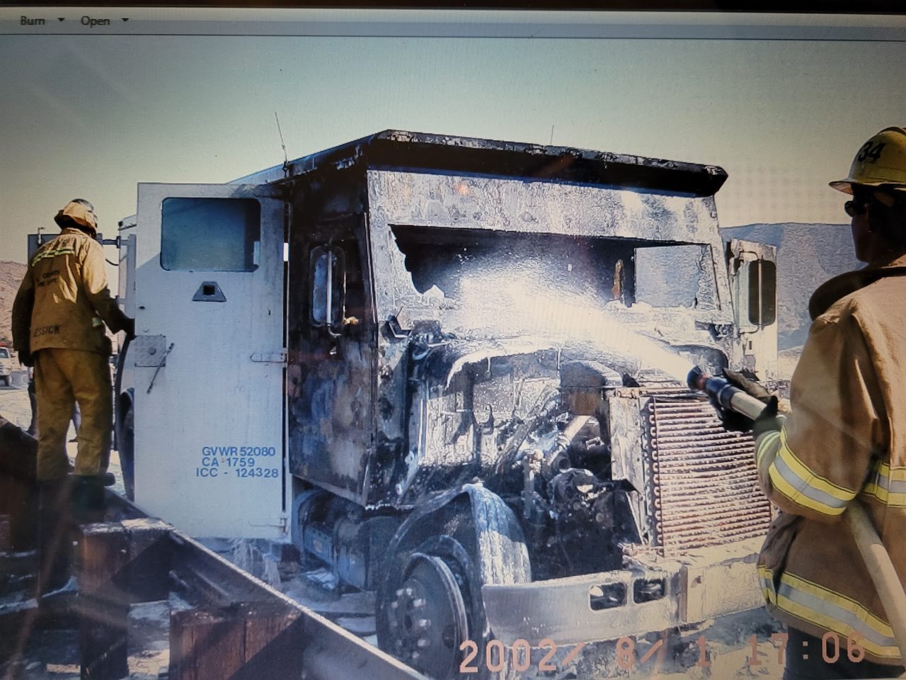 Overhaul of the burned cab and engine compartment of an armored transport truck, August 2002
