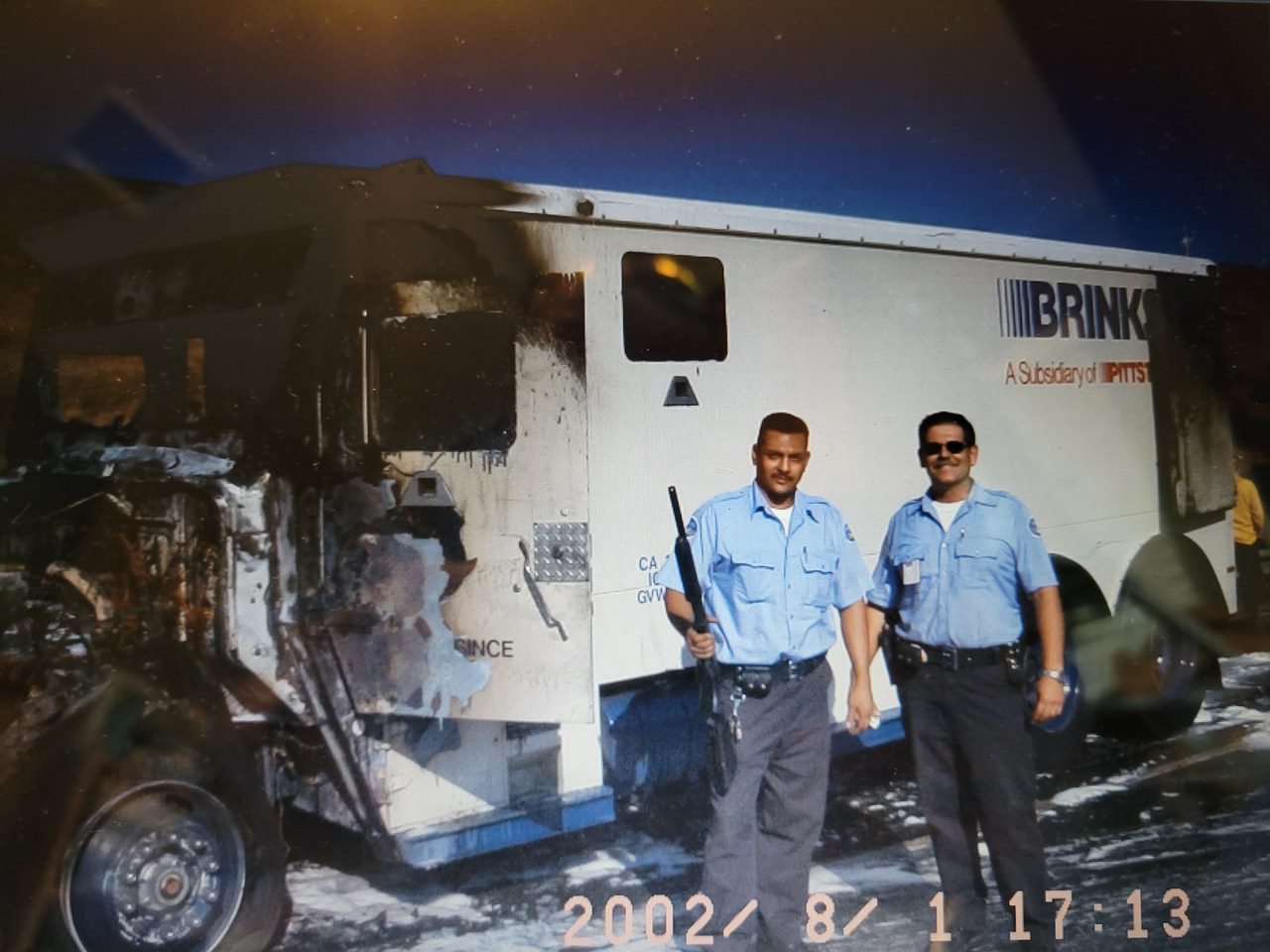 The burned-out armored transport truck after the fire was knocked down, August 2002